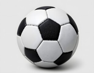 Fototapeta premium Close Up of a Classic Black and White Soccer Ball on a Neutral Background