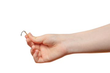 A hand holds a burnt match on a transparent background