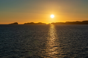 Sunset along Inside Passage cruise near Vancouver Island, British Columbia, Canada.