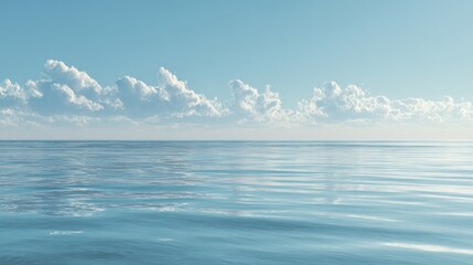 Obraz premium A serene panoramic view of the vast blue ocean under a calm sky with white clouds on the horizon, depicting tranquility and natural beauty.