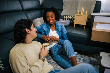 Couple enjoying coffee in new home