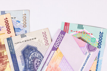 Money in various denominations from Uzbekistan som cash