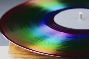 Vinyl record in rainbow colors, closeup view