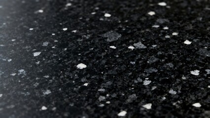 Close-up view of black granite surface with white specks