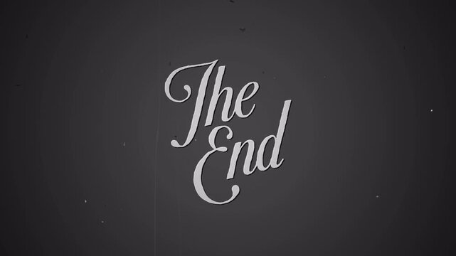 The end old film movie text writing with grain dark background 4k video