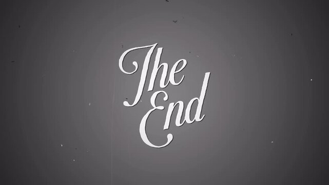 The end old film movie text animation with grain dark background. Black and white vintage retro animation .4k video