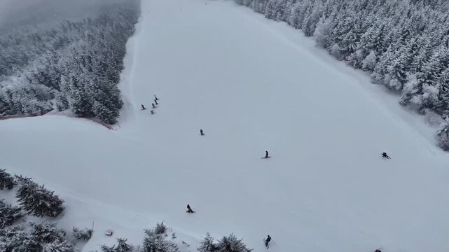 Aerial top down view of skiers Dolni Morava Czech Republic 