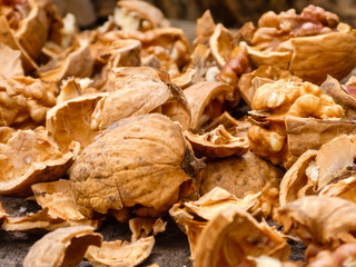 Rustic Close-up of Cracked Walnut Shells and Kernels