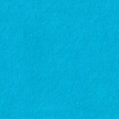 Seamless bright cyan blue paper texture with a soft grain and smooth matte surface. Natural fiber paper with subtle grain. Handmade recycled paper surface. Soft vintage paper with minimal texture. 