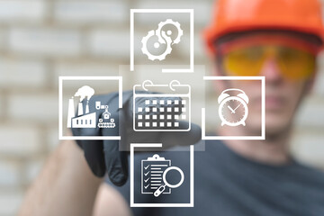 Industrial worker using virtual touch screen presses the icon CALENDAR. Industry planning, production scheduling, time management, organization concept. Organizing manufacturing work tasks.
