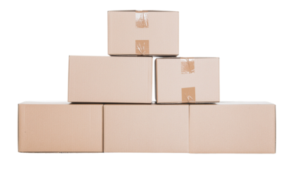 Cardboard boxes stacked in a pyramid shape with packing tape securing them, arranged on a flat surface, isolated on a white background cutout