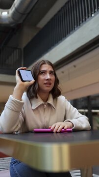 Vertical screen искусственный интеллект shocks the student as she lifts her phone and listens with wide eyed disbelief to another completely incorrect answer that leaves her stunned and confused