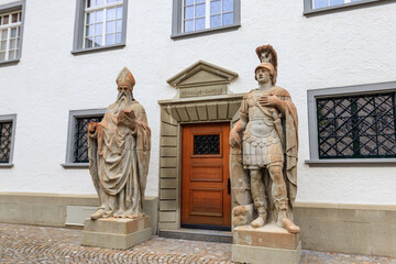 Entrance to the St. Gallus chapel with statues of Desiderius of Vienne and Saint Maurice in courtyard Cathedral of Saint Gall Abbey in St. Gallen, Switzerland