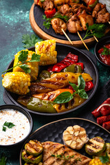 Assortment of grilled bbq meat and vegetables