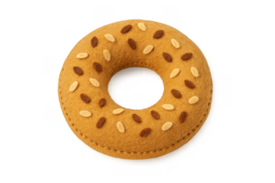 Handcrafted felt bagel toy representing a delicious breakfast item with sesame seeds, isolated on transparent background - Powered by Adobe