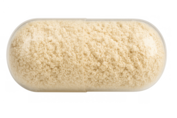 Transparent capsule filled with beige powder, a nutritional supplement or pharmaceutical medication on a health and wellness focus