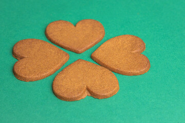 gingerbread hearts on a green background