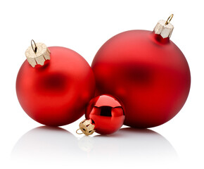 Three Christmas red baubles isolated on white background