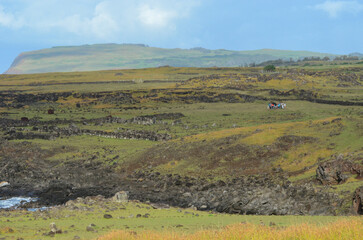 Mesmerizing Easter Island landscapes: grassy plains, hills, blue sky