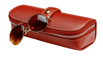 Stylish Eyewear: Elegant sunglasses rest casually upon a sleek, handcrafted leather case, symbolizing style and protection. 