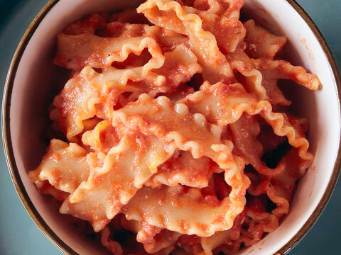 Nottingham, England, December 26, 2024. A bowl full of mafalde with ricotta, a type of pasta with wavy, curled edges that, thanks to its shape, holds the sauce better, enhancing the flavor of the dish