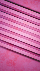 Abstract Christmas Background with Diagonal Geometric Stripes in Candy Pink and Magenta Tones for Modern Holiday Design corporate presentation