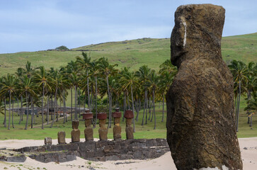 Moai statues overlook greenery and beach at Anakena, Easter Island
