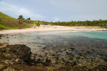 Anakena Beach, clear waters, historic moai statues on Easter Island