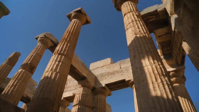 Ancient Greek Temple Columns against a Clear Blue Sky