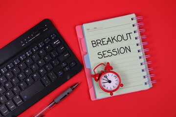 a black keyboard, notebook labeled 