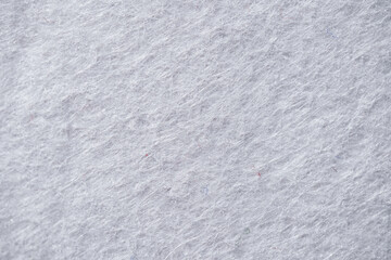 Closeup of White Felt Fabric Texture with Soft Fiber Surface