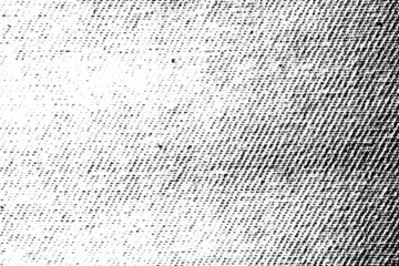 High-contrast diagonal dot texture with grunge distortion and fading density, isolated on a transparent background.