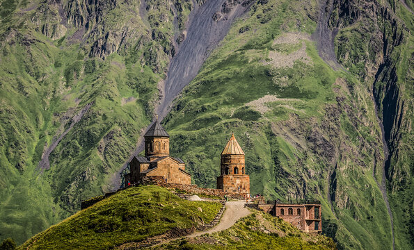 Tsminda Sameba - Trinity Church in Caucasus Mountains in Gergeti village near Stepantsminda in Georgia