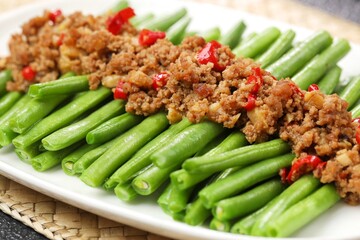 Tumis buncis daging cincang. Delicious stir-fried green beans with minced meat or Gan Bian Si Ji Dou