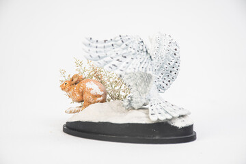 The owl is hunting rabbits on isolated background