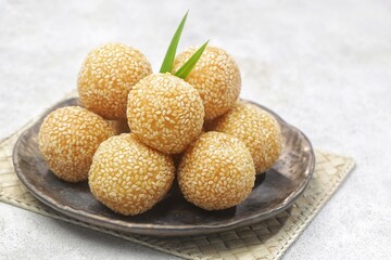 Onde-onde or sesame balls are a type of market snack cake that is famous in Indonesia. Sesame balls are easy to find in traditional markets or sold at street vendors