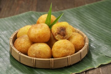 Misro or Klenyem is a snack made from grated cassava, the inside of which is filled with brown sugar and then fried
