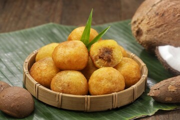 Misro or Klenyem is a snack made from grated cassava, the inside of which is filled with brown sugar and then fried
