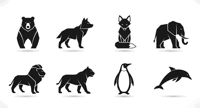 Silhouettes of Wild Animals Including Bear, Wolf, Cat, Elephant, Lion, Dog, Penguin, and Dolphin in Minimalist Black Icons Set