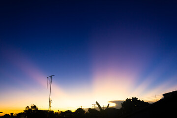 Sunset sky with cloud and sunbeams. 