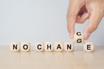 No change, no chance. Hand turns a dice and changes the expression "no change" to "no chance"