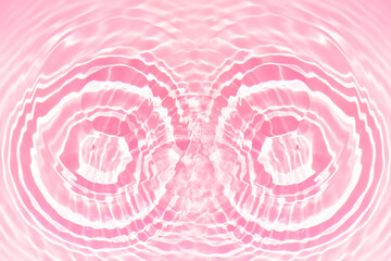 Pink water bubbles on the surface ripples. Defocus blurred transparent pink colored clear calm...