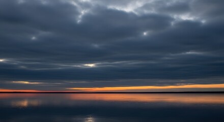 Serene Horizon Reflective Waters Under a Dramatic, Cloud-Streaked Sunset Sky