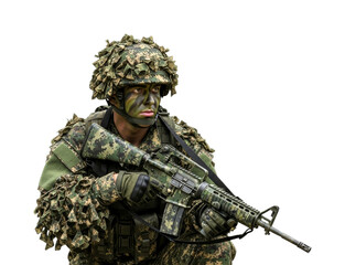 Vigilant tactical soldier in full camouflage uniform and face paint crouches, holding an assault rifle with a serious expression, ready for action