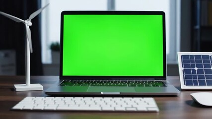 Clean Energy Solutions Display with close up of green screen laptop and wind turbine on the table next to solar cell at office distortion, overlay, glitch, static noise, scan lines black background - Powered by Adobe