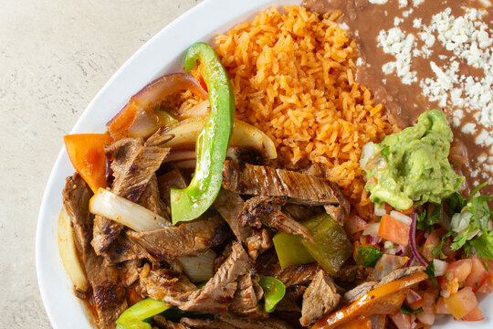 A top down view of a plate of bistec ranchera.