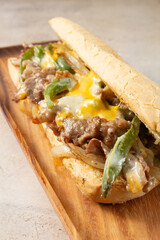 A view of a Philly cheesesteak sandwich.