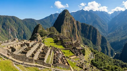 Fototapete Fotos Panoramic view of Machu Picchu stone ruins and mountains in Peru  © Seasonal Mood