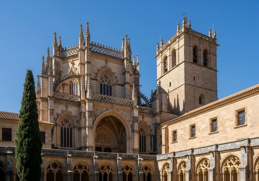 Historic Salamanca Cathedral with Intricate Gothic Architecture and Clear Blue Sky. - Powered by Adobe