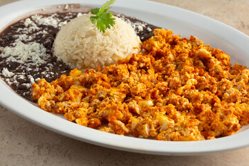 A closeup view of a plate of huevos con chorizo.